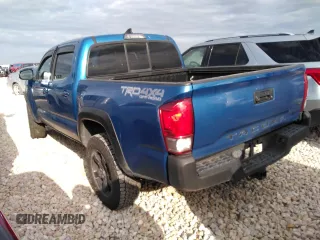 2016 Toyota Tacoma SR with VIN 5TFCZ5AN0GX045905, listed as a Copart auction lot 51798555 with 104,292 mi miles and Salvage Title. Bid and sale history available at DreamBid. Image 2.