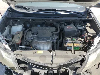 2014 Toyota RAV4 LE with VIN JTMZFREV4EJ006299, listed as a Copart auction lot 62403265 with 130,215 mi miles and Salvage title. Bid and sale history available at DreamBid. Image 12.