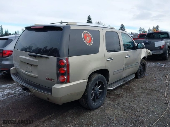 2010 GMC Yukon Denali with VIN 1GKUKEEF5AR129925, listed as a IAAI auction lot 41488638 with 109148 miles. Bid and sale history available at carsss.com. Image 4.