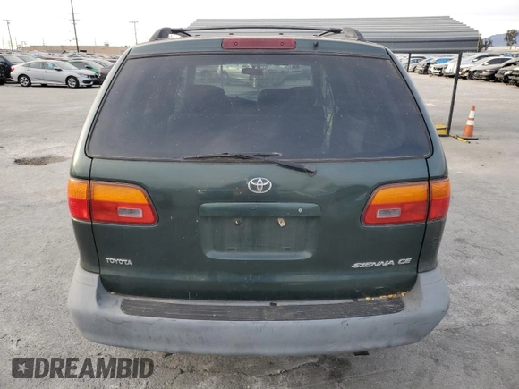 1999 Toyota Sienna CE with VIN 4T3ZF19C1XU146082, listed as a Copart auction lot 82063524 with 158,294 mi miles and Clean Title. Bid and sale history available at carsss.com. Image 6.