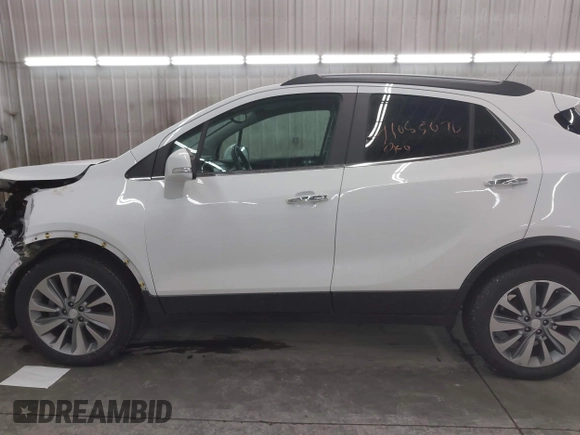 2018 Buick Encore Preferred with VIN KL4CJESB7JB596133, listed as a IAAI auction lot 41085078 with 99,000 mi miles. Bid and sale history available at carsss.com. Image 14.