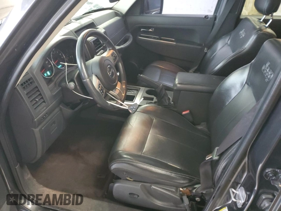 2011 Jeep Liberty Limited 70th Anniversary with VIN 1J4PN5GK4BW524055, listed as a Copart auction lot 52209065 with 184,692 mi miles and Salvage Title. Bid and sale history available at DreamBid. Image 7.