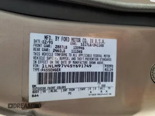 1995 Lincoln Continental with VIN 1LNLM97V4SY691749, listed as a Copart auction lot 41815915 with 69,582 mi miles and Salvage Title. Bid and sale history available at carsss.com. Image 12.