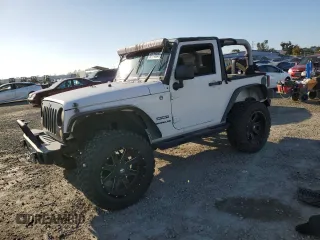 2010 Jeep Wrangler Sport with VIN 1J4AA2D16AL144842, listed as a Copart auction lot 50173535 with 106,000 mi miles and Salvage Title. Bid and sale history available at carsss.com. Image 1.