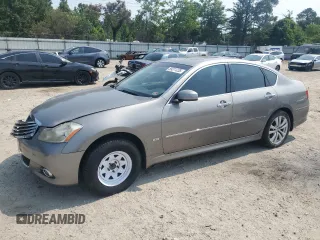 2010 Infiniti M with VIN JN1CY0ARXAM960720, listed as a Copart auction lot 59371235 with 207,157 mi miles and Salvage title. Bid and sale history available at DreamBid. Image 1.