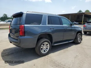 2020 Chevrolet Tahoe LT with VIN 1GNSKBKC0LR260766, listed as a Copart auction lot 61465725 with 104,850 mi miles and Salvage title. Bid and sale history available at DreamBid. Image 3.