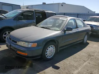 1997 Honda Accord EX with VIN 1HGCD5668VA113949, listed as a Copart auction lot 72819714 with 250,206 mi miles and Salvage Title. Bid and sale history available at carsss.com. Image 1.