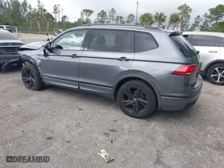 2023 Volkswagen Tiguan SE R-Line Black with VIN 3VVCB7AX1PM099075, listed as a IAAI auction lot 41600520 with 33,316 mi miles. Bid and sale history available at carsss.com. Image 3.