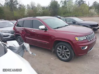 2017 Jeep Grand Cherokee Overland with VIN 1C4RJECG6HC719001, listed as a IAAI auction lot 41795517 with 103,076 mi miles. Bid and sale history available at carsss.com. Image 13.