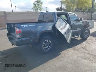 2022 Toyota Tacoma SR5 with VIN 3TMAZ5CN5NM181034, listed as a IAAI auction lot 42243200 with Not provided miles and . Bid and sale history available at DreamBid. Image 4.