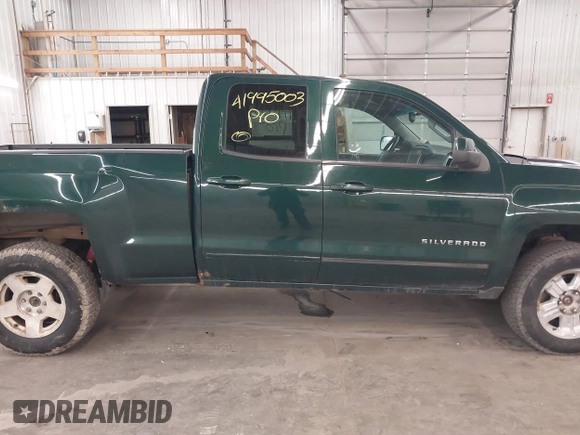 2015 Chevrolet Silverado 1500 LT with VIN 1GCVKREC2FZ147321, listed as a IAAI auction lot 41995003 with 148,053 mi miles and . Bid and sale history available at DreamBid. Image 14.
