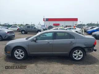 2012 Ford Fusion SE with VIN 3FAHP0HA9CR141588, listed as a IAAI auction lot 42485632 with 124,312 mi miles and . Bid and sale history available at DreamBid. Image 14.