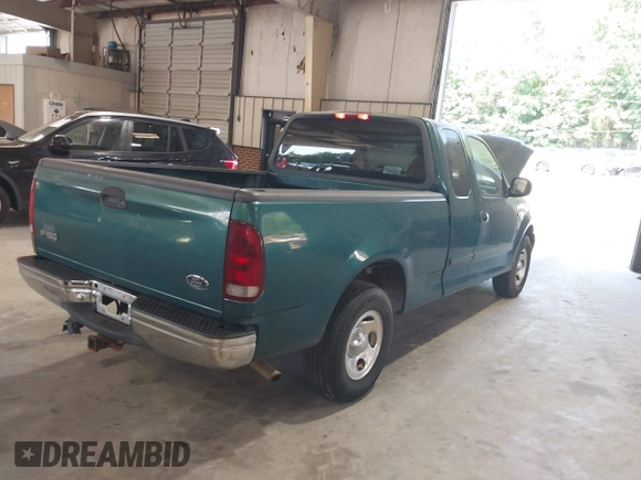 2000 Ford F-150 XL with VIN 1FTRX17L7YNA66620, listed as a IAAI auction lot 42622639 with Not provided miles and . Bid and sale history available at DreamBid. Image 4.