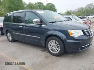 2014 Chrysler Town & Country Limited with VIN 2C4RC1GG3ER188114, listed as a IAAI auction lot 42082618 with 193,562 mi miles and . Bid and sale history available at DreamBid. Image 1.