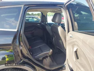 2016 Ford Escape Titanium with VIN 1FMCU9J97GUC21242, listed as a IAAI auction lot 42431567 with 96,946 mi miles and . Bid and sale history available at DreamBid. Image 8.