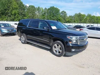 2019 Chevrolet Suburban LT z VIN 1GNSCHKC2KR198768, wystawiony jako IAAI lot #42663456 z przebiegiem 127 219 mil mil oraz . Historia ofert i sprzedaży dostępna na DreamBid. Obrazek 1.