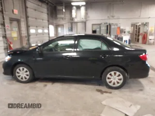 2009 Toyota Corolla with VIN 1NXBU40E29Z133733, listed as a IAAI auction lot 42093904 with 229,509 mi miles. Bid and sale history available at carsss.com. Image 14.