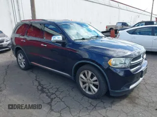 2011 Dodge Durango Crew with VIN 1D4SE4GT4BC593593, listed as a IAAI auction lot 42085058 with 119,578 mi miles and . Bid and sale history available at carsss.com. Image 1.