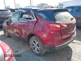 2021 Chevrolet Equinox Premier z VIN 2GNAXNEV7M6140889, wystawiony jako IAAI lot #42039443 z przebiegiem 101 767 mil mil oraz . Historia ofert i sprzedaży dostępna na DreamBid. Obrazek 3.