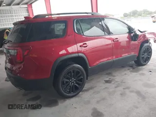 2023 GMC Acadia SLT with VIN 1GKKNMLS4PZ174923, listed as a IAAI auction lot 41393635 with 22,174 mi miles and . Bid and sale history available at DreamBid. Image 4.