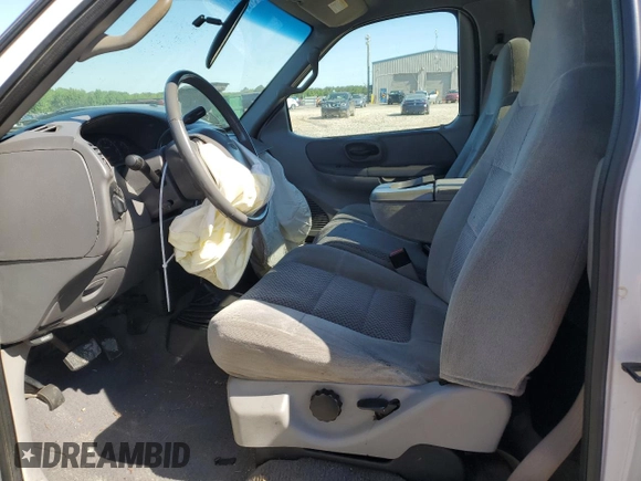 2001 Ford F-150 XL with VIN 1FTRF18L41NB60977, listed as a Copart auction lot 54933785 with 238,700 mi miles and Salvage title. Bid and sale history available at DreamBid. Image 7.