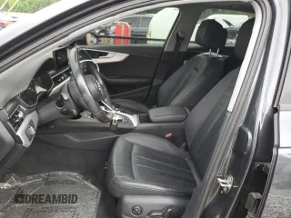 2018 Audi A4 Premium с VIN WAUDNAF48JA139823, выставлен на аукционе Copart как лот 56099335 с пробегом 42 455 миль миль и Списание • Salvage title. История ставок и продаж доступна на DreamBid. Изображение 7.