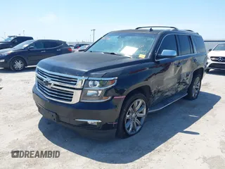 2015 Chevrolet Tahoe LTZ with VIN 1GNSCCKC4FR309152, listed as a IAAI auction lot 42029341 with 187,313 mi miles and . Bid and sale history available at DreamBid. Image 2.