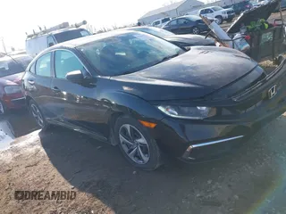2020 Honda Civic LX with VIN 19XFC2F68LE029699, listed as a IAAI auction lot 41894102 with 113,900 mi miles and . Bid and sale history available at DreamBid. Image 1.