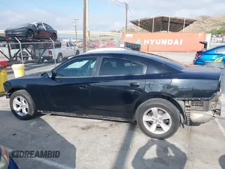 2013 Dodge Charger SE with VIN 2C3CDXBG6DH689066, listed as a IAAI auction lot 42110941 with 145,270 mi miles and . Bid and sale history available at DreamBid. Image 15.