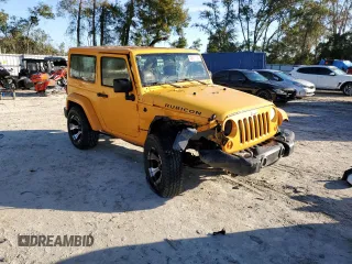 2012 Jeep Wrangler Rubicon with VIN 1C4BJWCG2CL135789, listed as a Copart auction lot 42556365 with 121,908 mi miles and Salvage title. Bid and sale history available at DreamBid. Image 4.