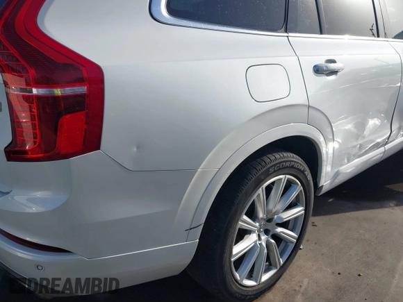 2016 Volvo XC90 Momentum with VIN YV4102XK4G1059299, listed as a IAAI auction lot 41749794 with 76,439 mi miles and . Bid and sale history available at DreamBid. Image 20.