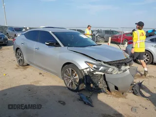 2016 Nissan Maxima Platinum with VIN 1N4AA6AP3GC414226, listed as a IAAI auction lot 41538986 with 125,556 mi miles and . Bid and sale history available at DreamBid. Image 1.