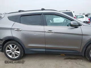 2015 Hyundai Santa Fe z VIN 5XYZW4LA9FG283826, wystawiony jako IAAI lot #42289253 z przebiegiem 120 369 mil mil oraz . Historia ofert i sprzedaży dostępna na DreamBid. Obrazek 14.
