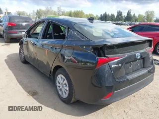 2021 Toyota Prius L Eco with VIN JTDKAMFU3M3140233, listed as a IAAI auction lot 42182685 with 38,842 mi miles and . Bid and sale history available at DreamBid. Image 3.