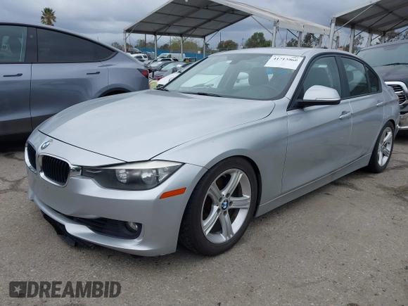 2014 BMW 3 Series 328i with VIN WBA3C1C53EK109613, listed as a IAAI auction lot 41713060 with 141,240 mi miles. Bid and sale history available at carsss.com. Image 2.