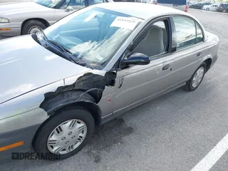 1997 Saturn SL z VIN 1G8ZH5285VZ117635, wystawiony jako IAAI lot #42153929 z przebiegiem 193 224 mil mil oraz . Historia ofert i sprzedaży dostępna na DreamBid. Obrazek 6.