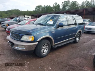 1998 Ford Expedition XLT with VIN 1FMRU17L1WLA99979, listed as a IAAI auction lot 41569667 with 215,937 mi miles. Bid and sale history available at carsss.com. Image 2.