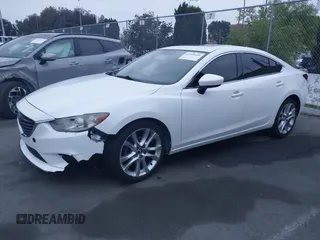 2016 Mazda Mazda6 i Touring with VIN JM1GJ1V52G1468807, listed as a IAAI auction lot 41888686 with 121,764 mi miles. Bid and sale history available at carsss.com. Image 19.