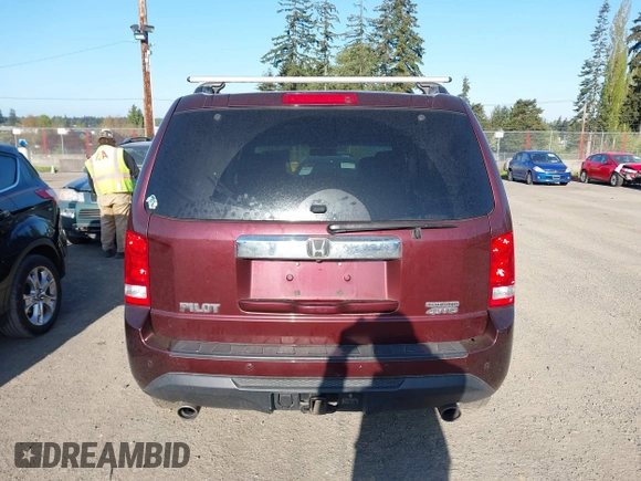 2014 Honda Pilot Touring with VIN 5FNYF4H93EB502117, listed as a IAAI auction lot 42086774 with 111,003 mi miles and . Bid and sale history available at carsss.com. Image 17.
