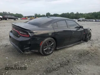 2019 Dodge Charger Scat Pack z VIN 2C3CDXGJ7KH697176, wystawiony jako Copart lot #53702845 z przebiegiem 76 988 mil mil oraz Szkoda całkowita • Salvage title. Historia ofert i sprzedaży dostępna na DreamBid. Obrazek 3.