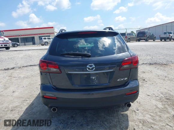 2014 Mazda CX-9 Grand Touring with VIN JM3TB2DA4E0436340, listed as a IAAI auction lot 42442249 with 102,856 mi miles and . Bid and sale history available at DreamBid. Image 16.