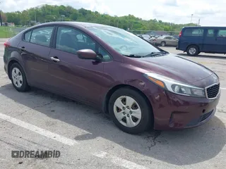 2018 Kia Forte LX with VIN 3KPFK4A70JE165286, listed as a IAAI auction lot 42128779 with 124,348 mi miles. Bid and sale history available at carsss.com. Image 1.