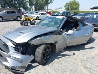 2021 Ford Mustang EcoBoost z VIN 1FATP8UH2M5120162, wystawiony jako IAAI lot #42561125 z przebiegiem 55 360 mil mil oraz . Historia ofert i sprzedaży dostępna na DreamBid. Obrazek 20.