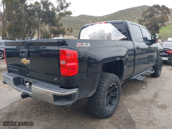 2014 Chevrolet Silverado 1500 LT with VIN 3GCUKREC2EG552511, listed as a IAAI auction lot 41745914 with 196,182 mi miles. Bid and sale history available at carsss.com. Image 4.