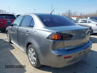 2014 Mitsubishi Lancer ES z VIN JA32U2FU5EU000609, wystawiony jako IAAI lot #41785055 z przebiegiem 140 496 mil mil oraz . Historia ofert i sprzedaży dostępna na DreamBid. Obrazek 3.