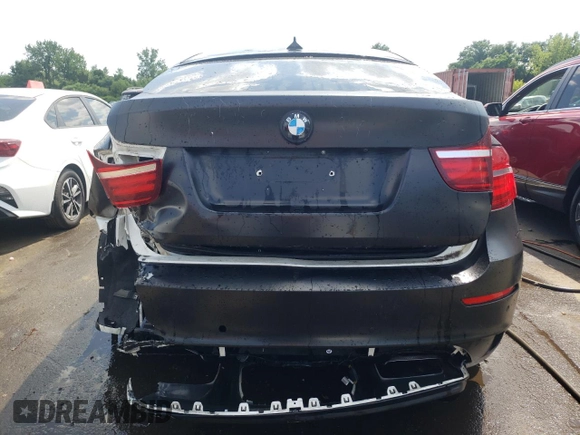 2013 BMW X6 M with VIN 5YMGZ0C50D0C40144, listed as a Copart auction lot 64889554 with 91,024 mi miles and Salvage Title. Bid and sale history available at carsss.com. Image 6.