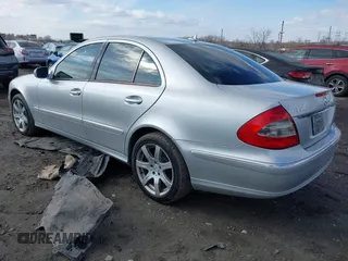 2007 Mercedes-Benz E-Class 3.5L with VIN WDBUF87X47X210117, listed as a IAAI auction lot 41508978 with 166,643 mi miles. Bid and sale history available at carsss.com. Image 3.