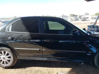 2005 Hyundai Sonata GLS with VIN KMHWF35H65A102053, listed as a IAAI auction lot 41690771 with 160,067 mi miles. Bid and sale history available at carsss.com. Image 13.