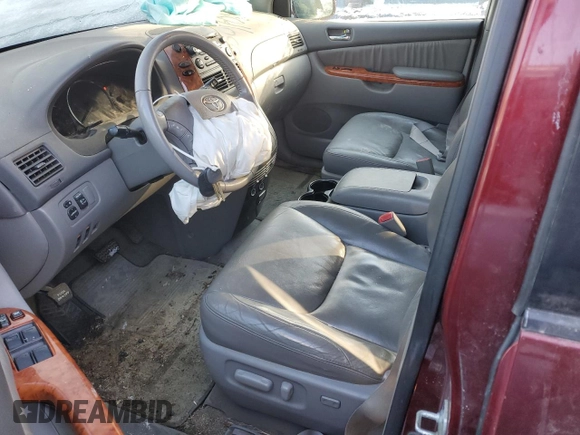 2009 Toyota Sienna XLE with VIN 5TDBK22C39S023000, listed as a Copart auction lot 88504705 with 197,811 mi miles and Salvage Title. Bid and sale history available at DreamBid. Image 7.