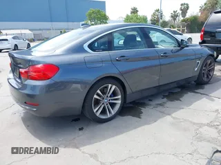 2015 BMW 4 Series 428i with VIN WBA4A5C59FGK15750, listed as a IAAI auction lot 42098856 with 62,530 mi miles and . Bid and sale history available at DreamBid. Image 4.